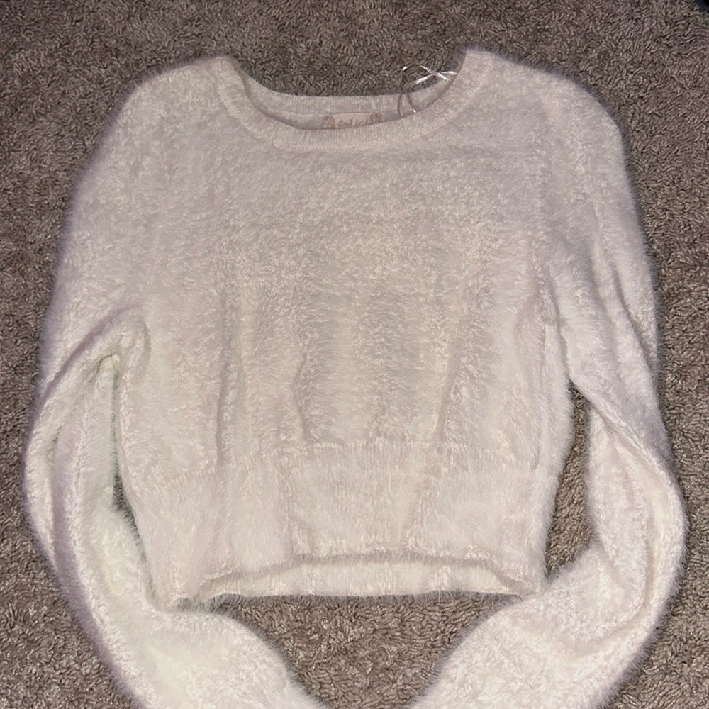 Cozy white top fashionable and perfect for every outing